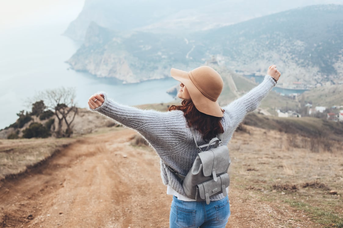 Girl Traveling in Mountains